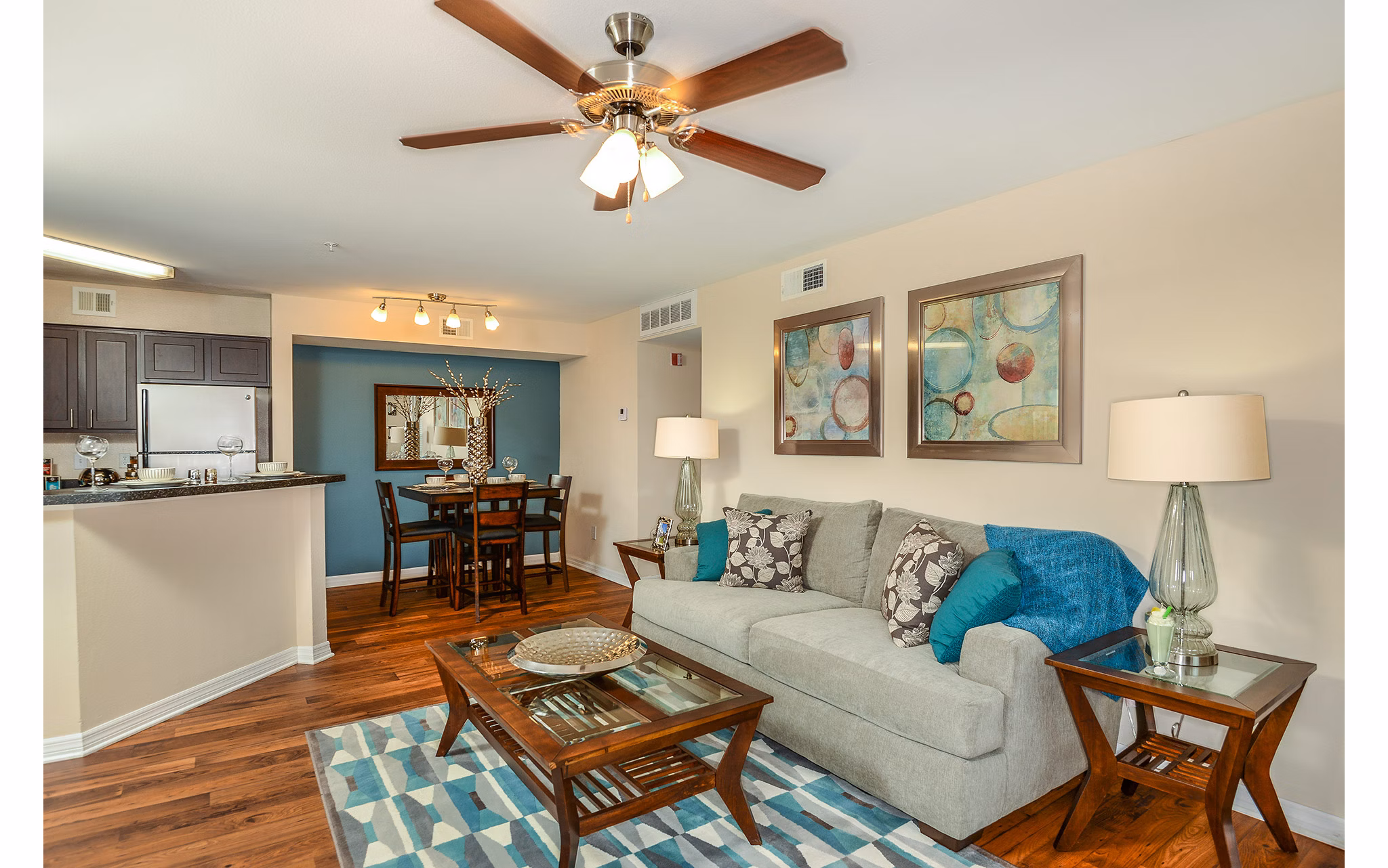 Spacious living room with modern decor at Stonebrook Apartments, luxury Greystar community