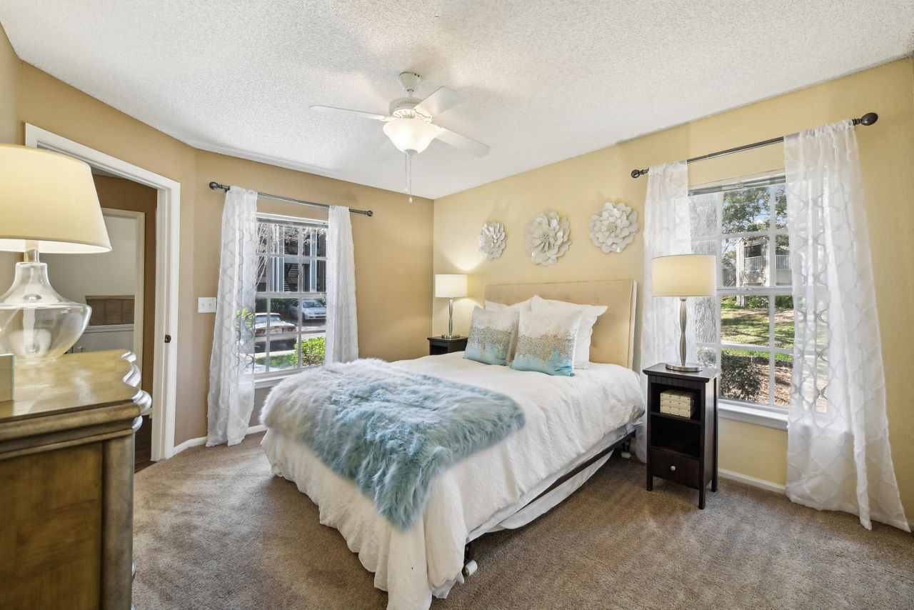 Cozy bedroom with stylish decor at Park Central Apartments - Manor Row