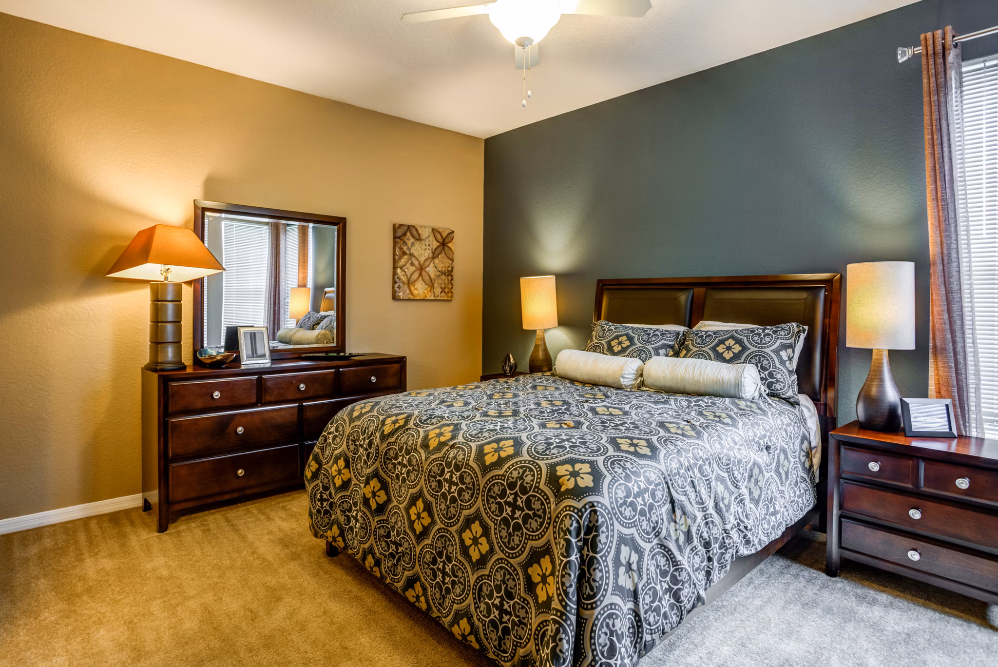 Cozy bedroom with stylish decor at Park Central Apartments - Manor Row