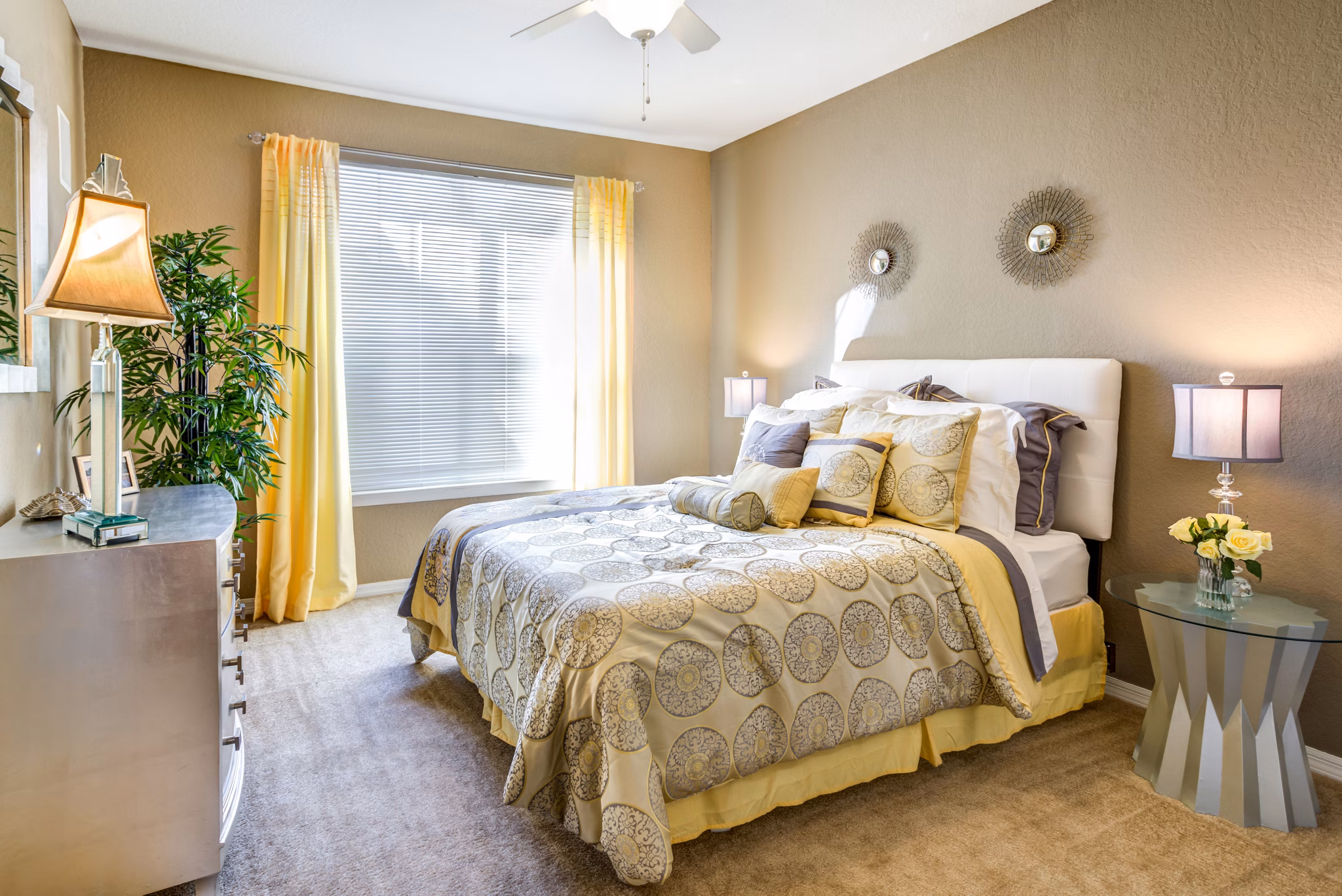 Cozy bedroom with modern decor at Park Central Apartments - Manor Row