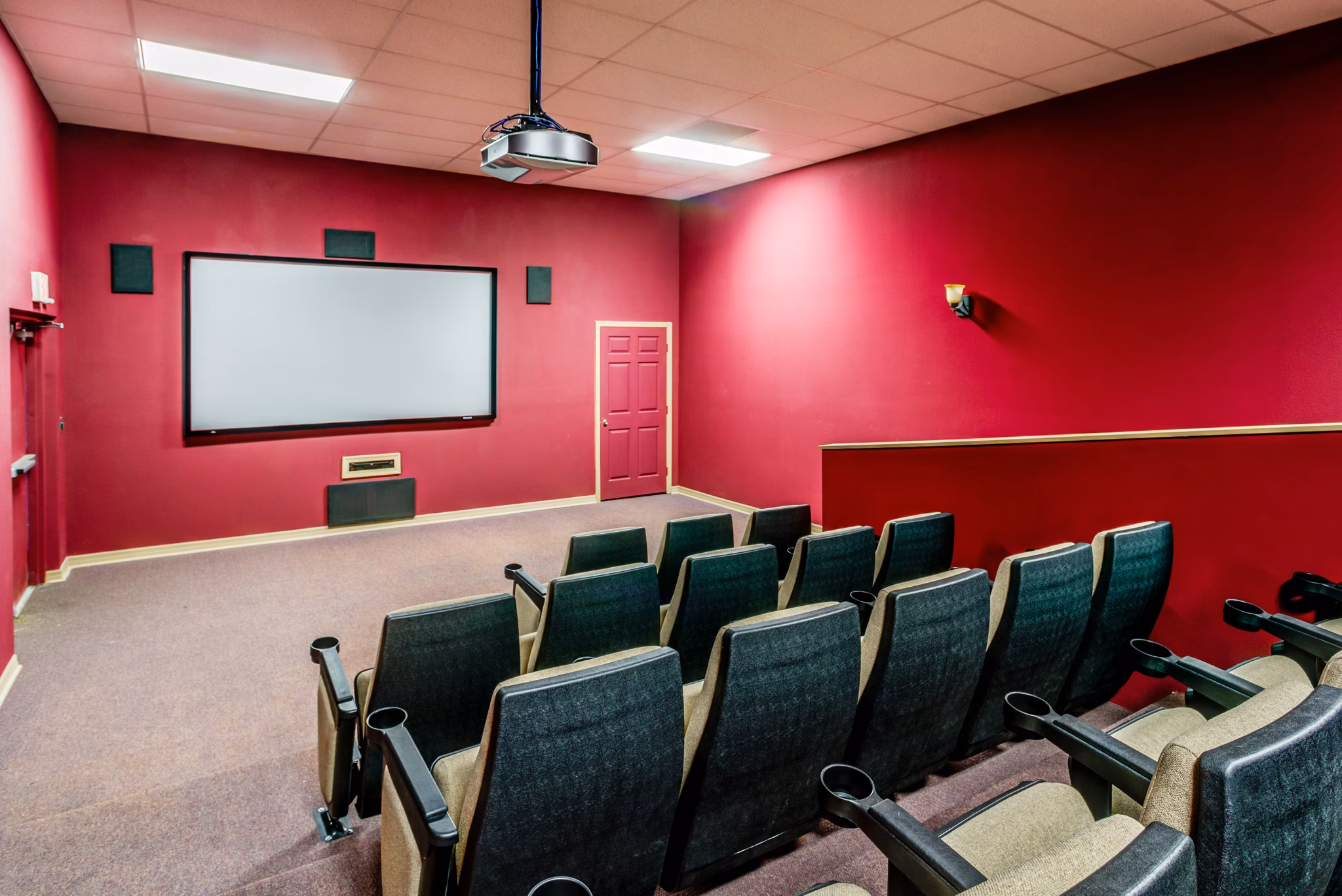 Elegant theater featuring plush seating at Park Central Apartments' Manor Row
