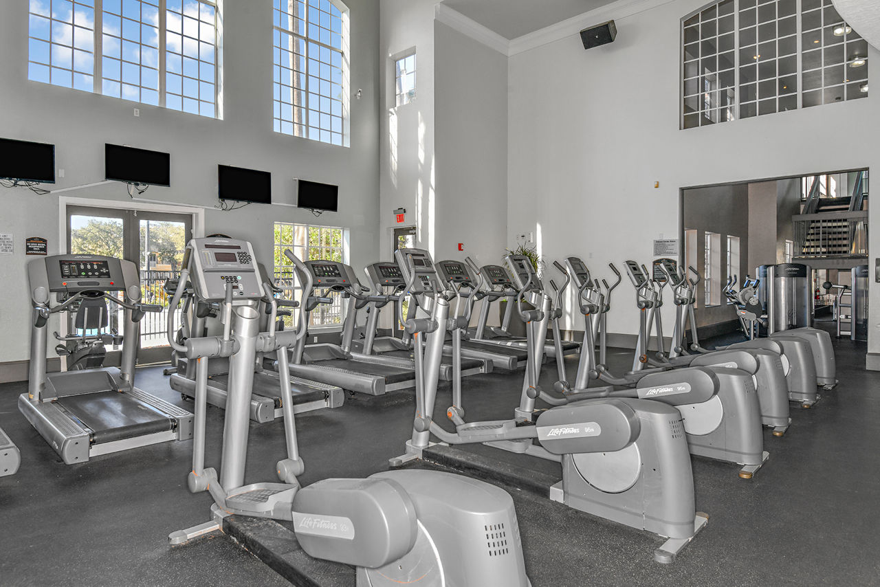 State-of-the-art fitness center at Park Central Apartments - Manor Row offering modern equipment for an active lifestyle
