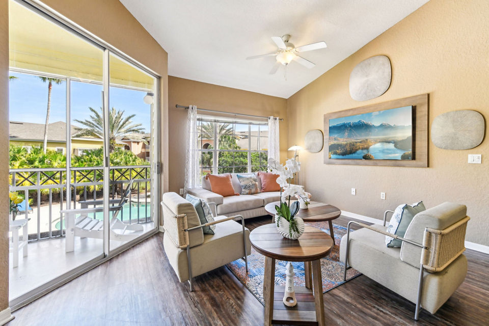 Spacious living room with modern decor at Park Central Apartments - Manor Row, offering luxury and comfort