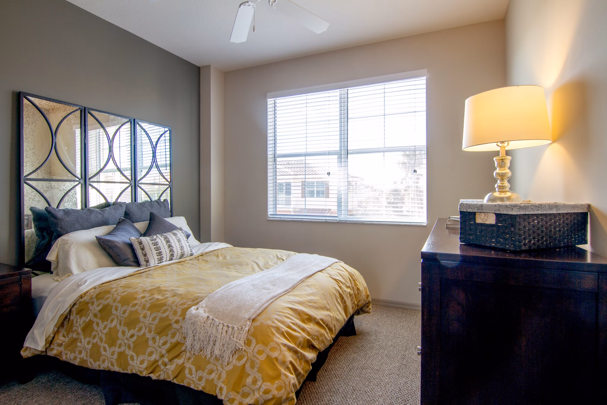 Cozy bedroom with modern decor at Midtown Delray Apartments