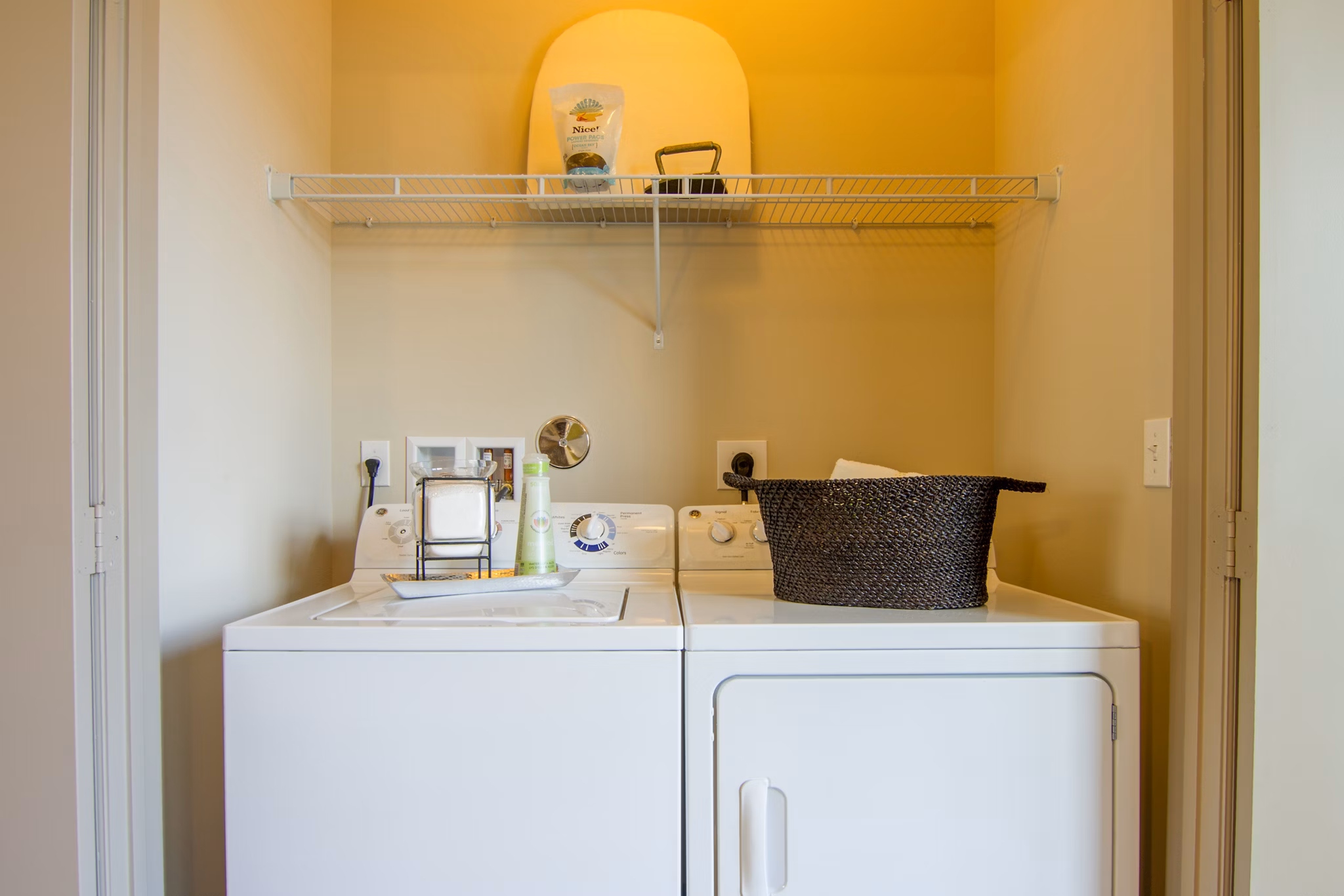 Laundry room featuring state-of-the-art appliances at Midtown Delray Apartments, luxury living by Greystar