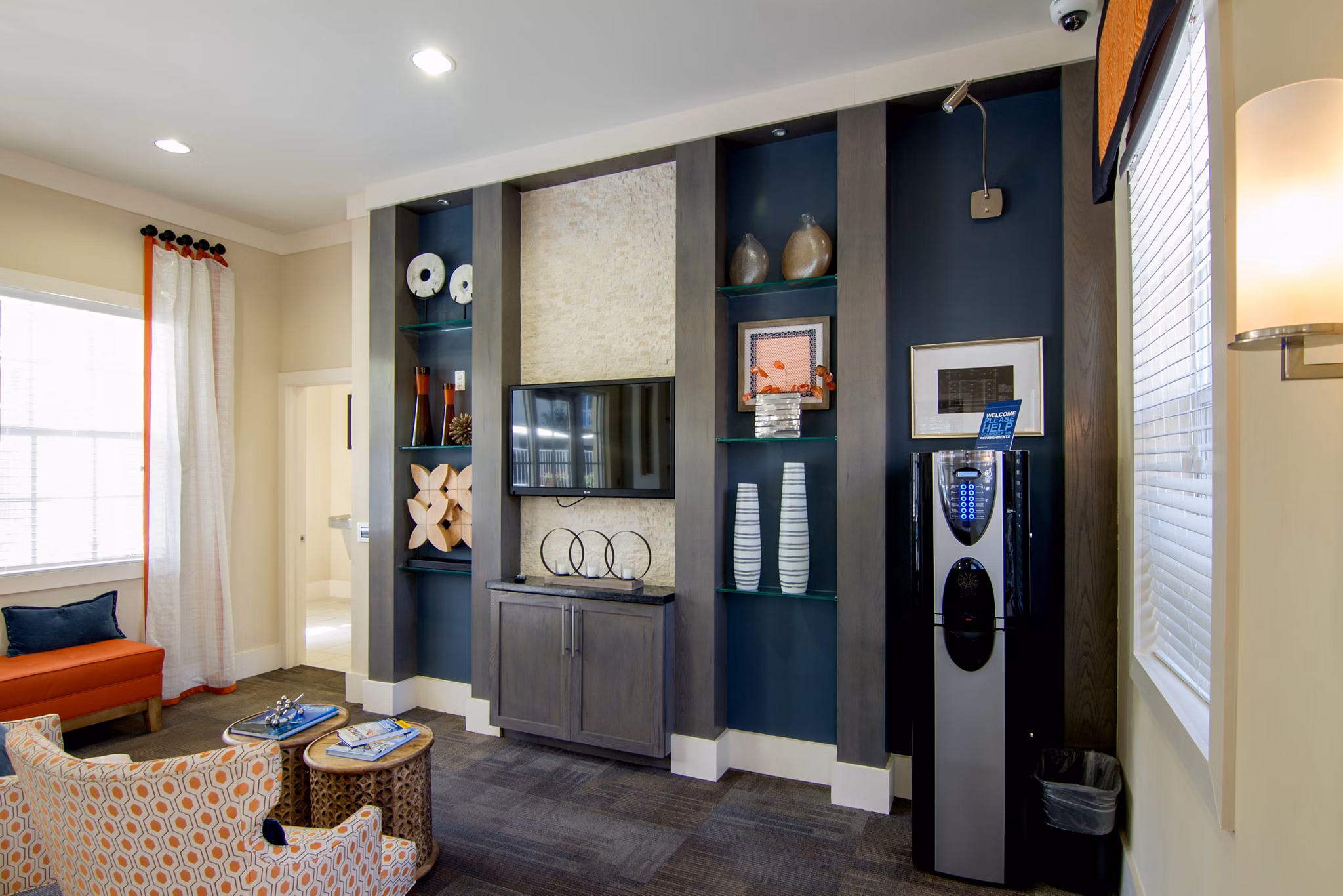 Outdoor recreational area with seating and green space at Midtown Delray Apartments, offering luxury living options