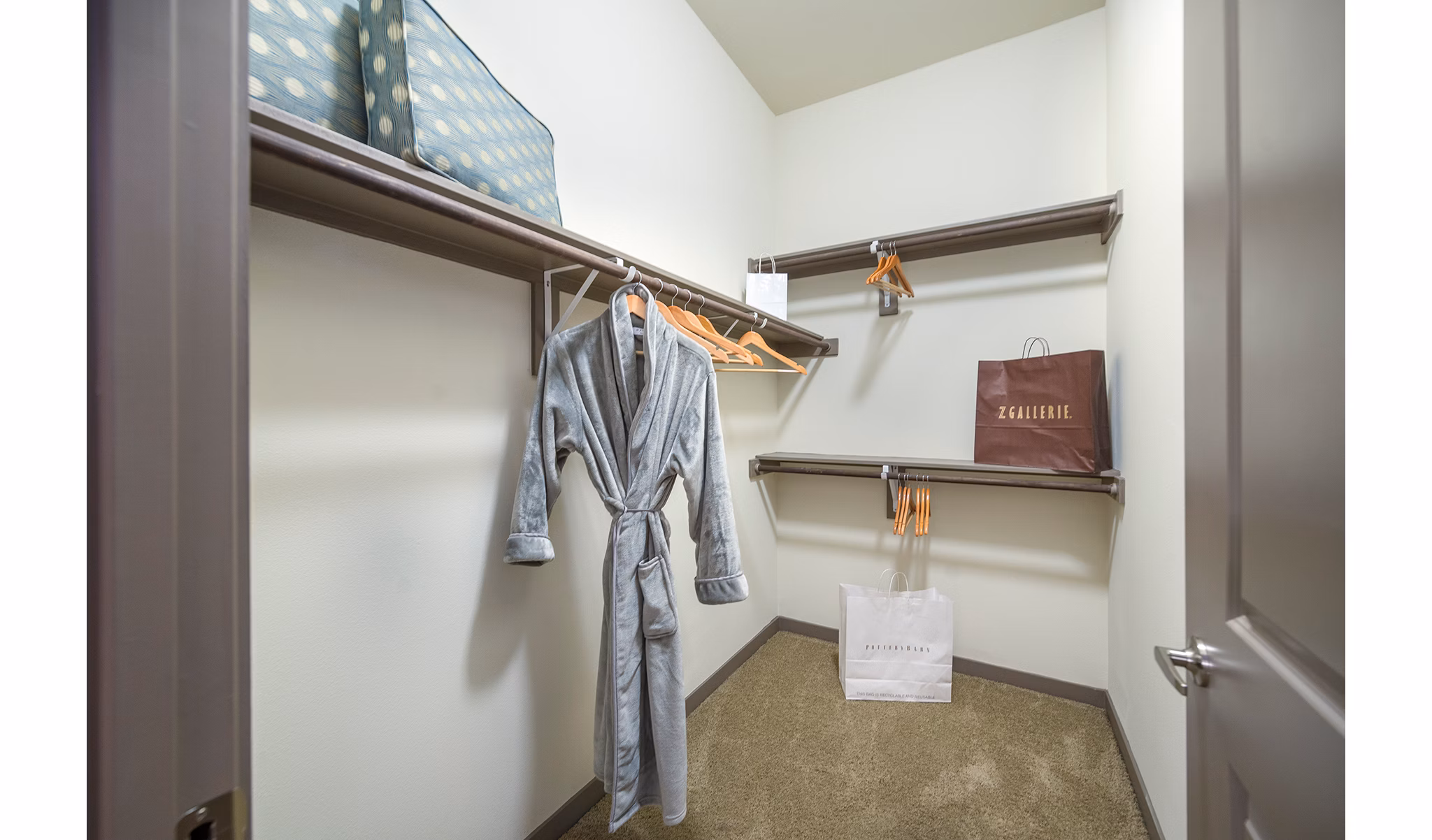 Spacious bedroom closet with ample storage in Overture Plano Apartments luxury community