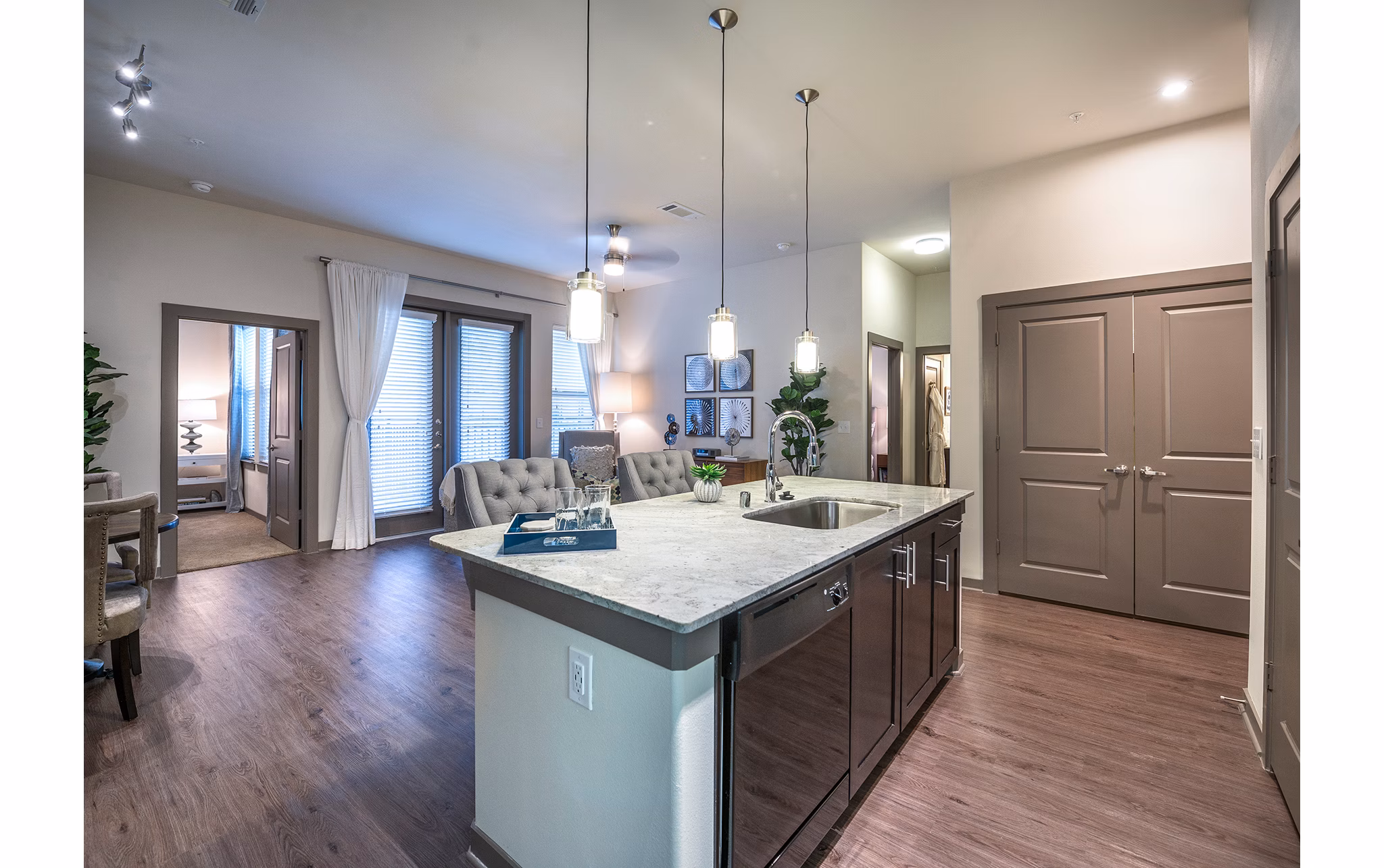 Modern kitchen with stainless steel appliances at Overture Plano Apartments for luxury living