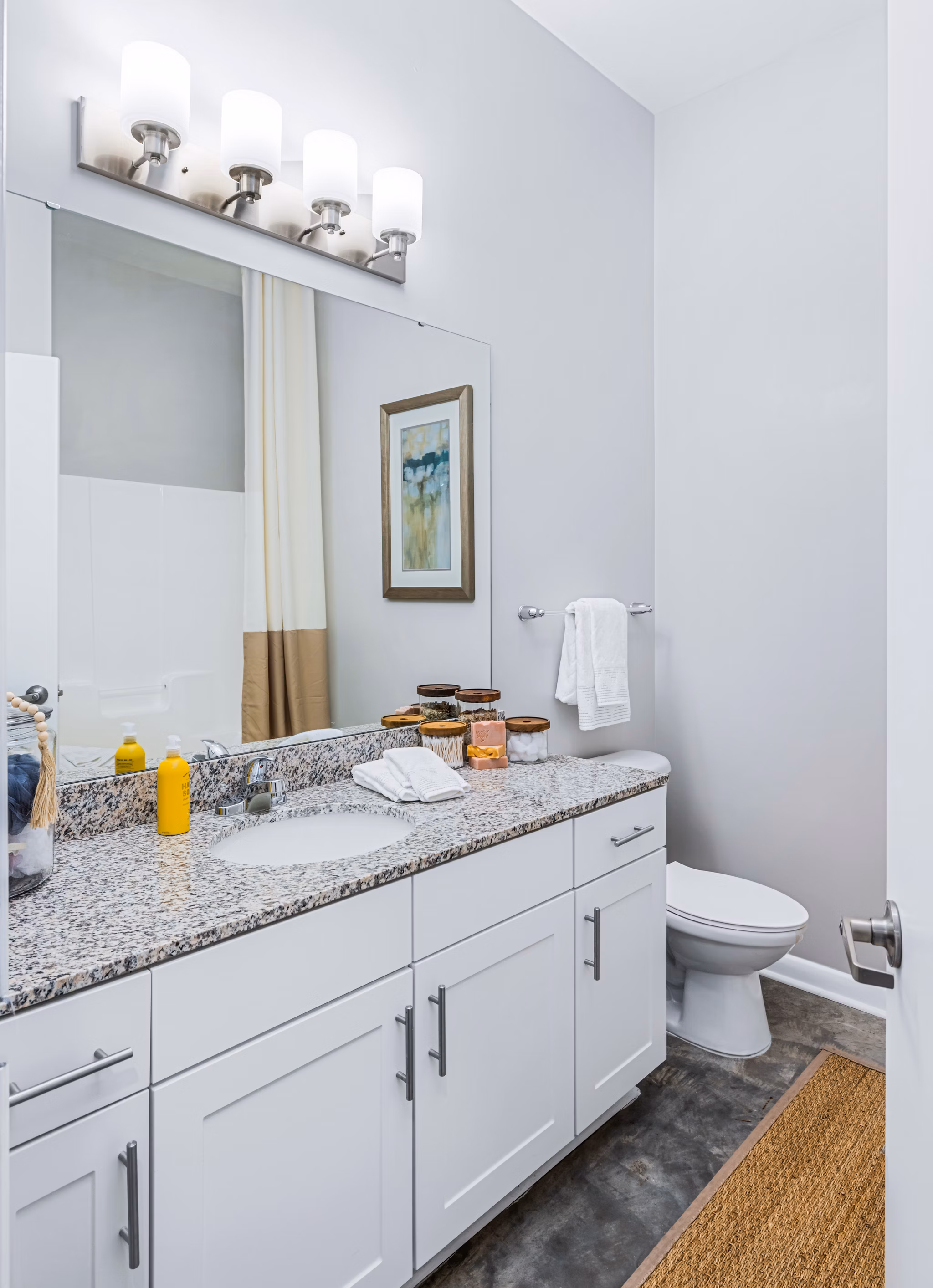 Elegant bathroom with marble finishes at Riviera at Seaside Apartments, offering a luxurious living experience near waterfront attractions