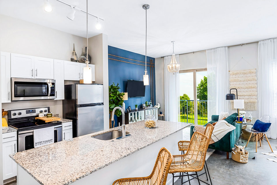 Modern kitchen with state-of-the-art appliances at Riviera at Seaside Apartments in luxury beachfront location
