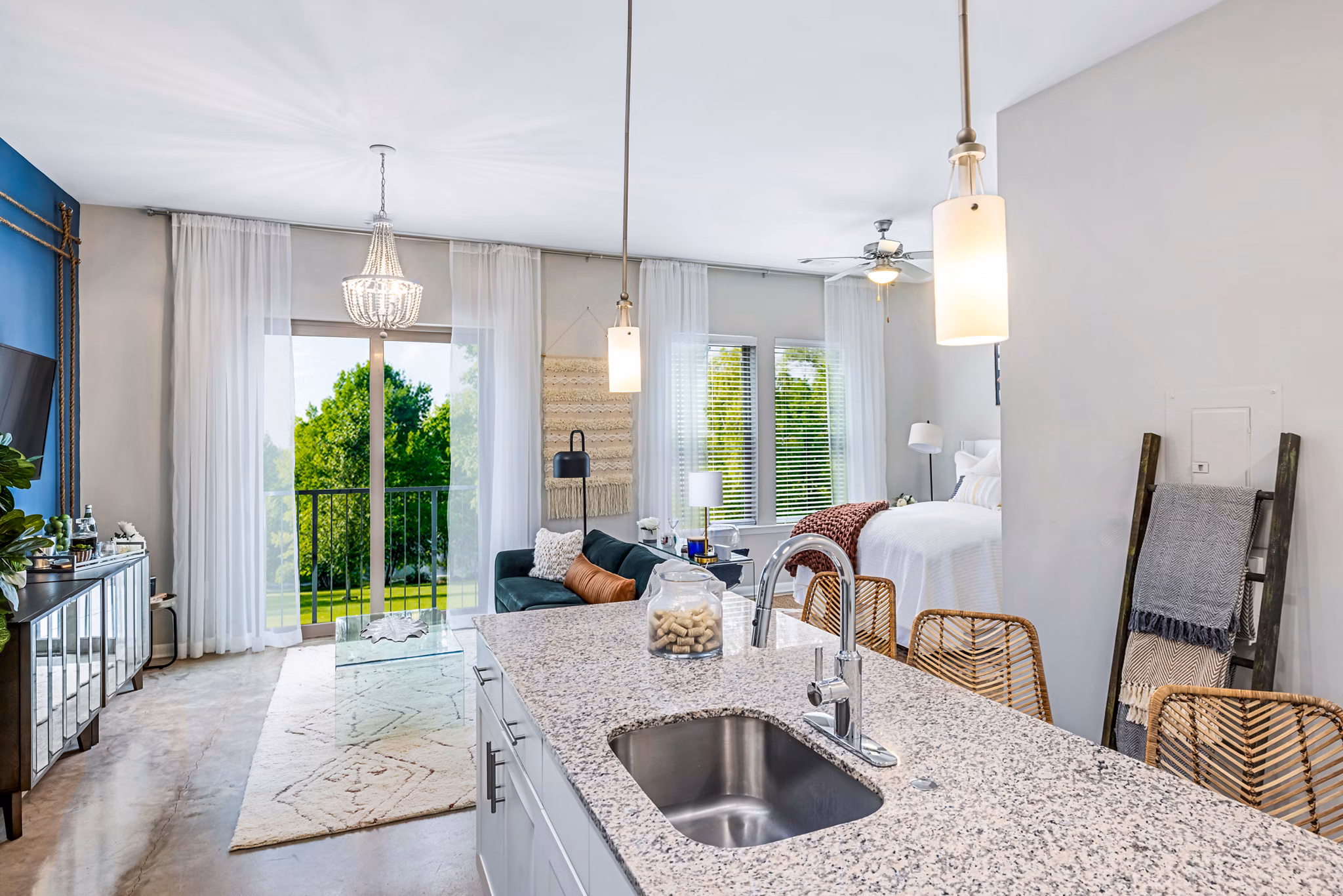 Modern kitchen with stainless steel appliances at Riviera at Seaside Apartments, Greystar luxury living