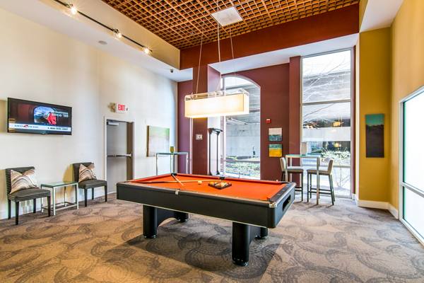 clubhouse game room at Midtown at Camp Springs Apartments