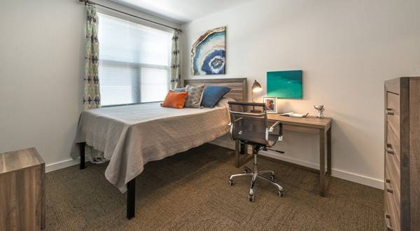 bedroom at College Town Student Apartments