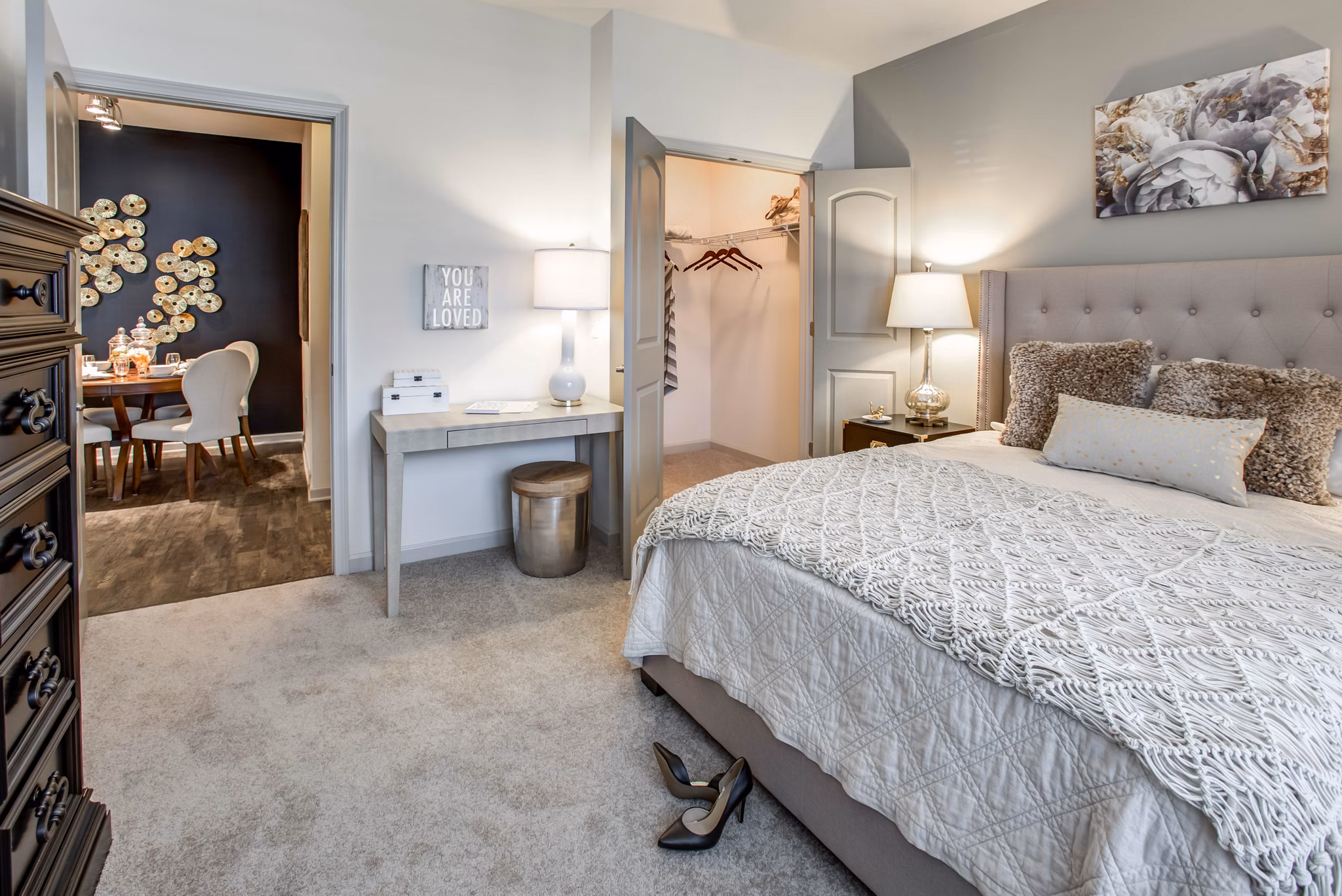Modern bedroom with elegant decor at The Reserve at the Boulevard Apartments