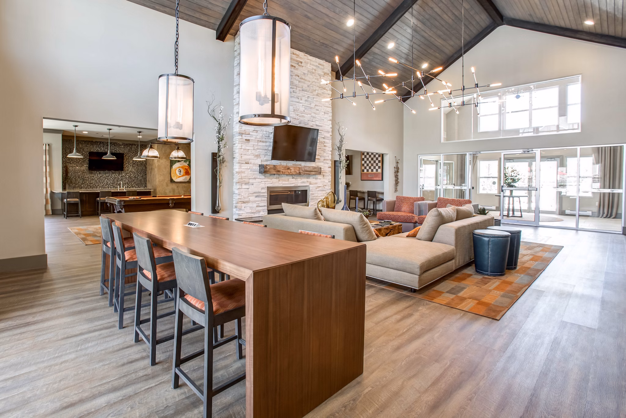 Clubhouse featuring billiards and lounge seating at The Reserve at the Boulevard Apartments