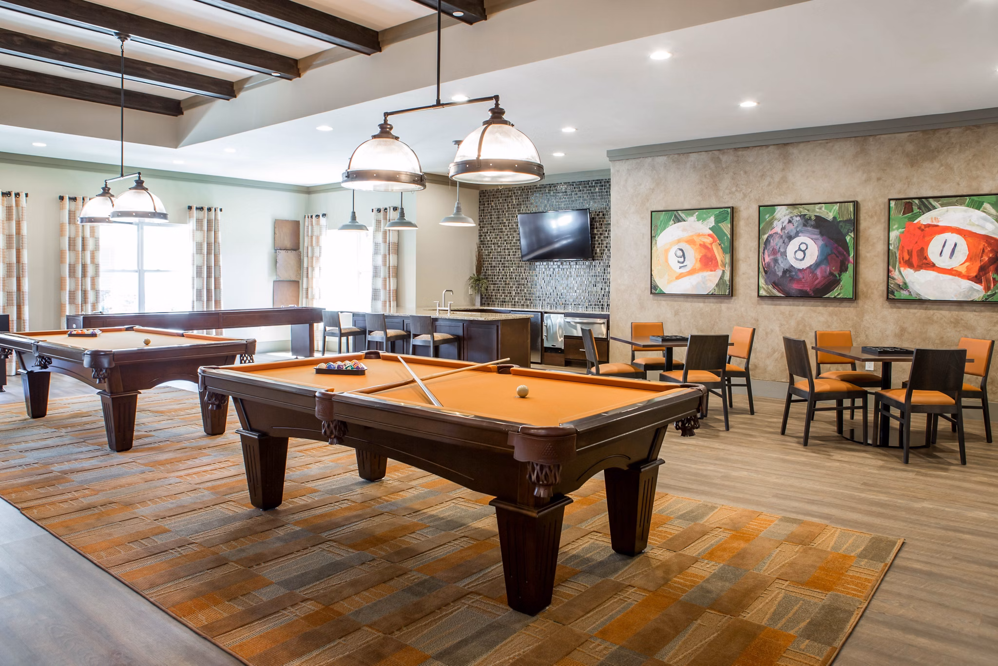 Clubhouse featuring modern design and cozy seating areas at The Reserve at the Boulevard Apartments