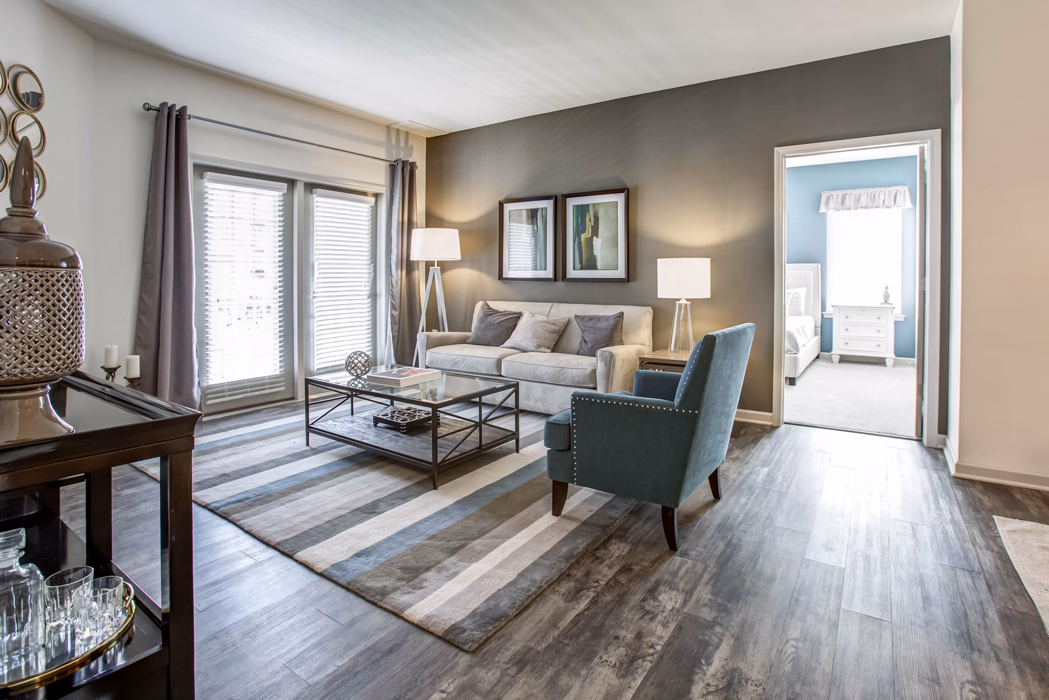 Elegant living room with contemporary decor in The Reserve at the Boulevard Apartments