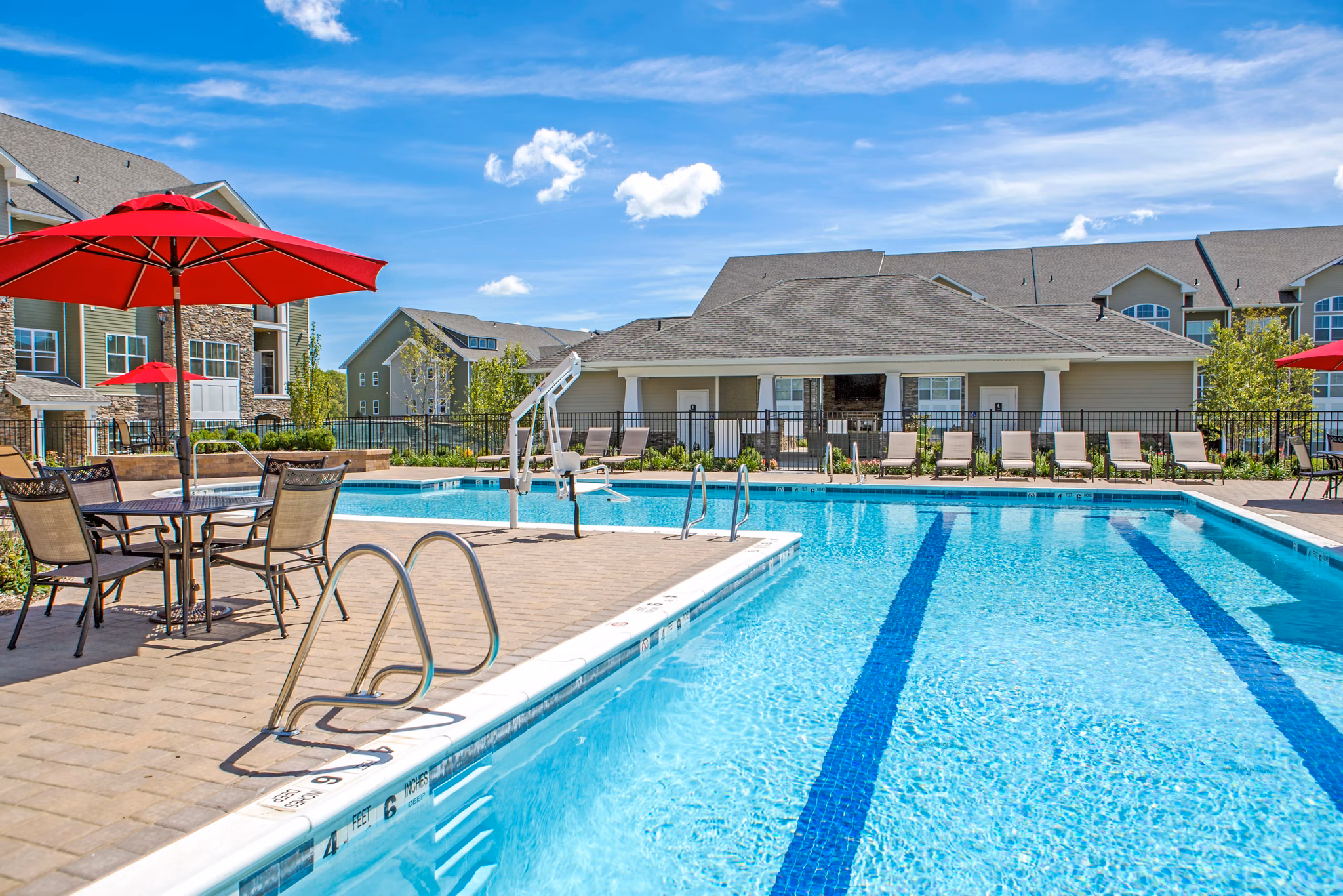 Resort-style pool area at The Reserve at the Boulevard Apartments offering luxury relaxation for residents