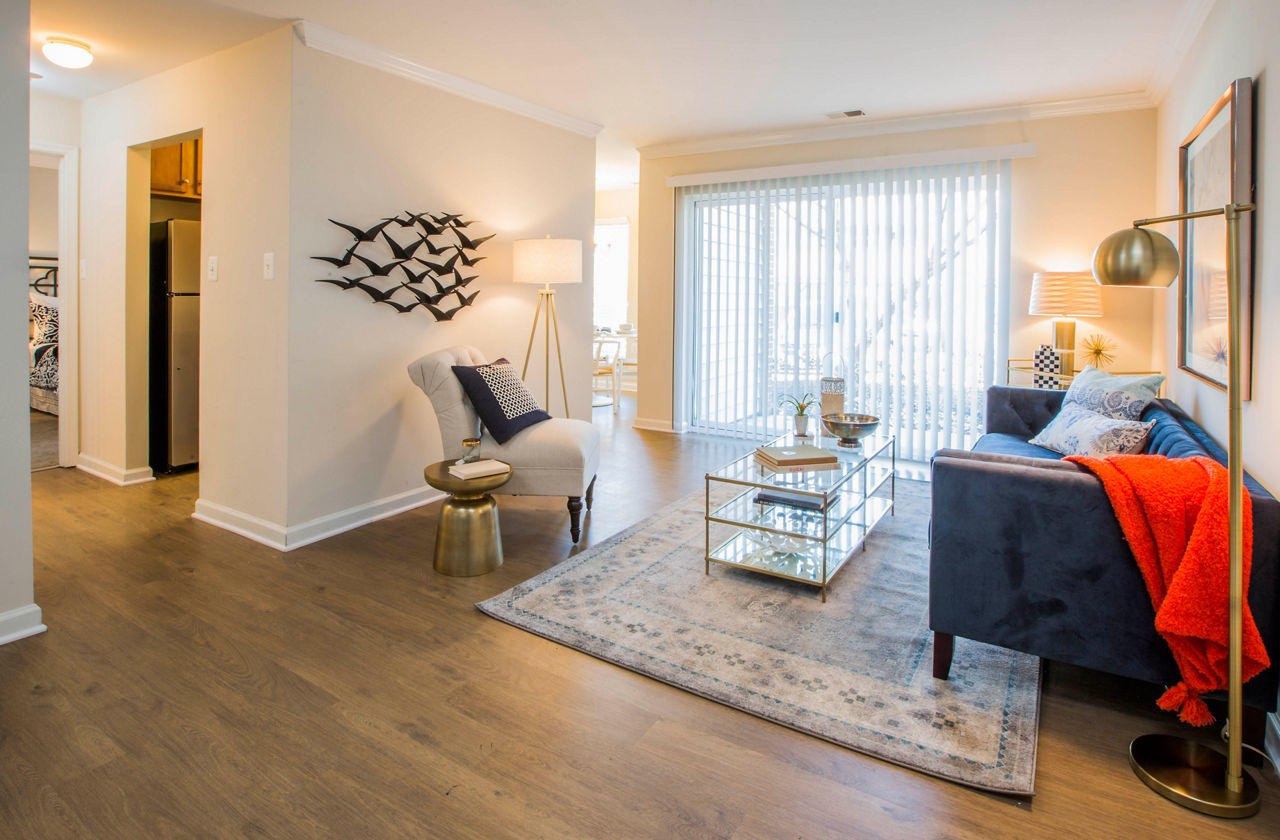 Bright living room with modern decor at Bayshore Landing Apartments