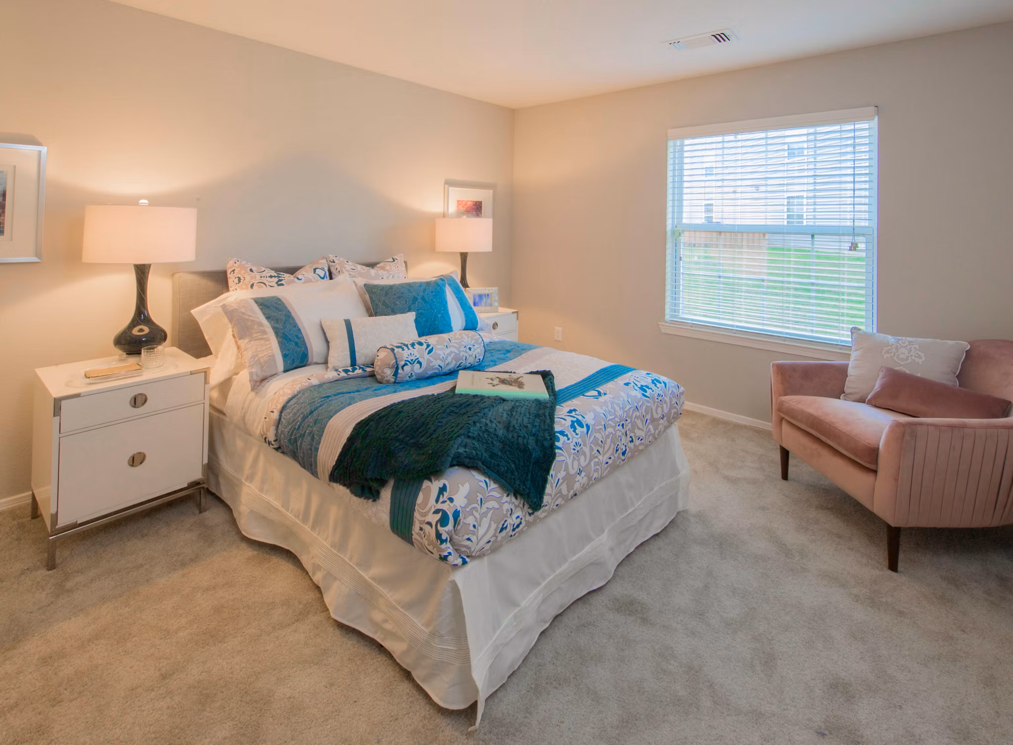 Cozy bedroom with modern decor at Southfield Apartments, luxury living by Greystar