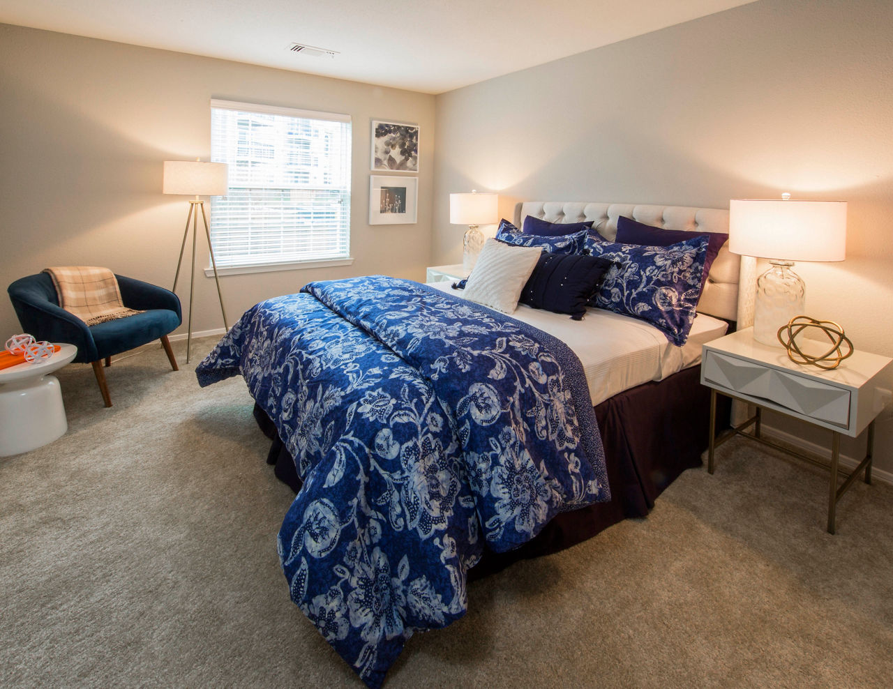 Cozy bedroom with elegant decor at Southfield Apartments, a Greystar luxury apartment community