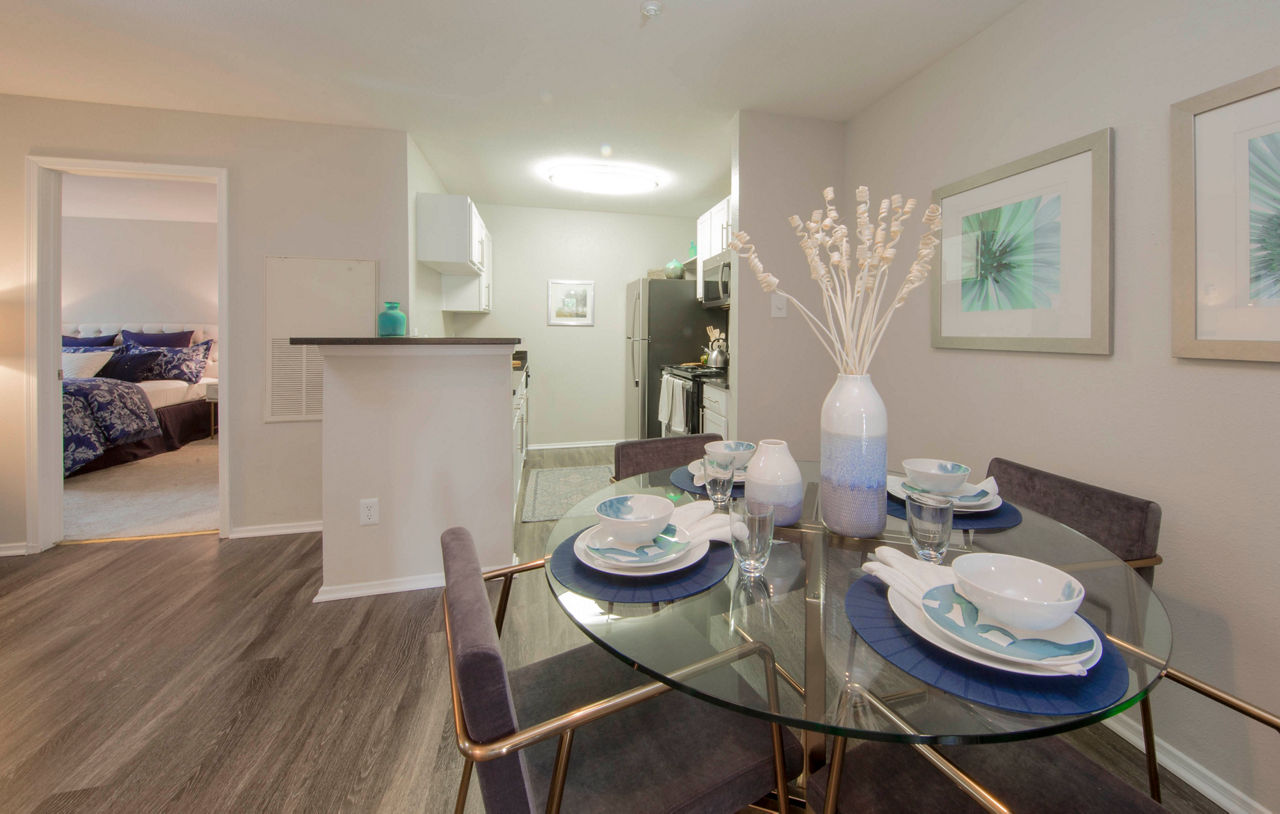 Elegant dining room with contemporary furnishings at Southfield Apartments, showcasing luxury living by Greystar