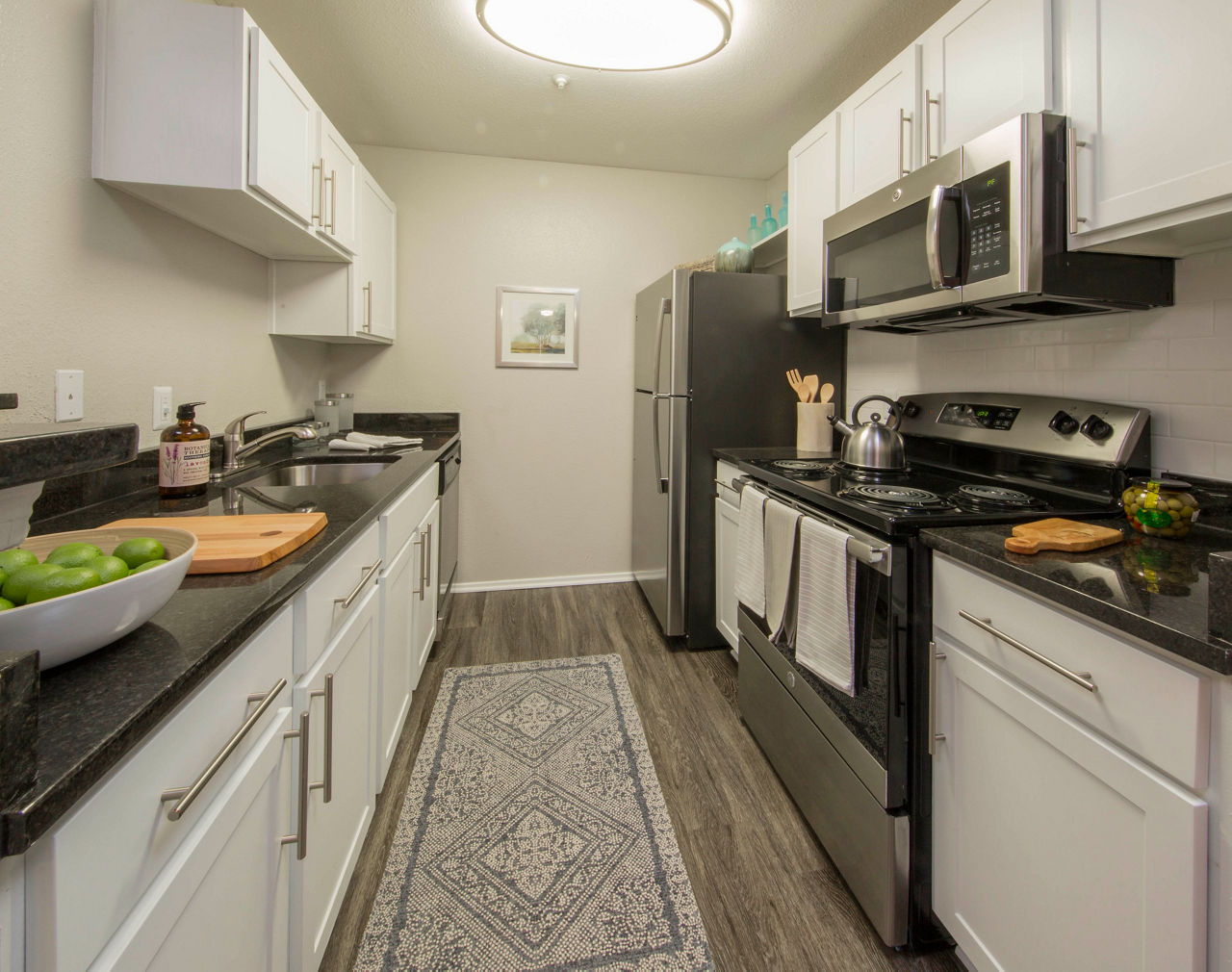 Modern kitchen with stainless steel appliances at Southfield Apartments luxury apartments