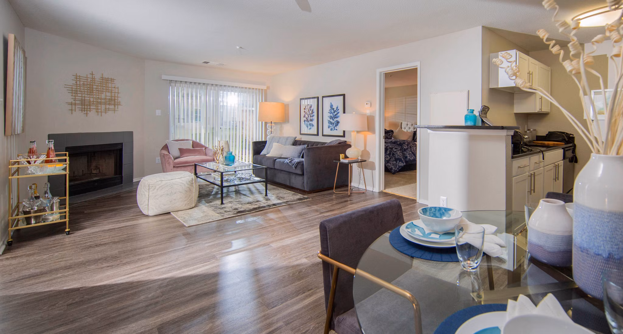 Spacious living room with modern decor in Southfield Apartments