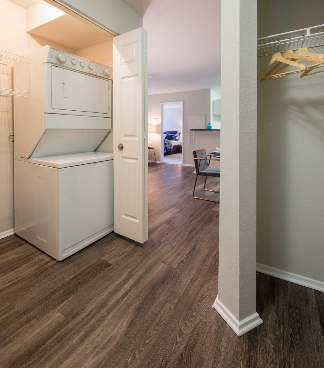 Laundry room with modern washers and dryers at Southfield Apartments