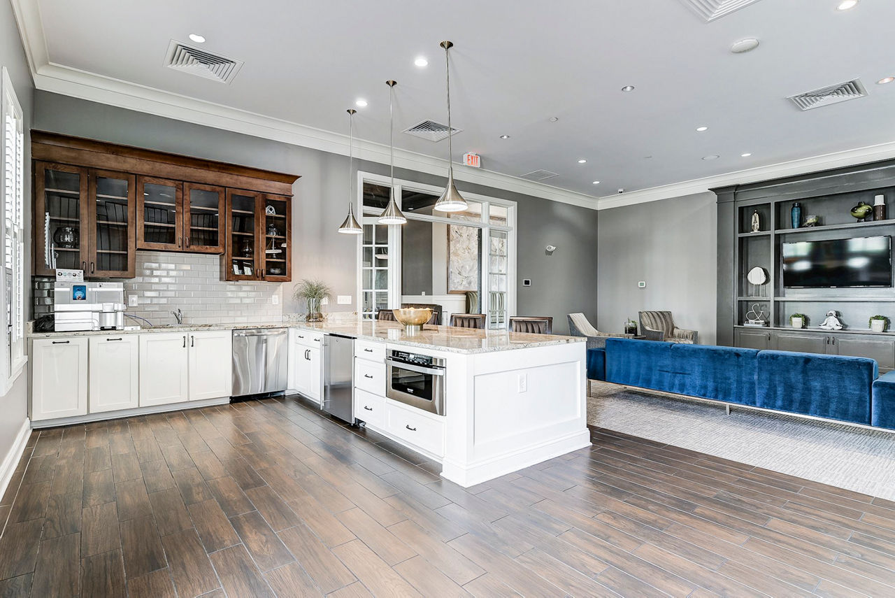 Clubhouse featuring modern seating and open spaces at Paragon at Columbia Overlook Apartments