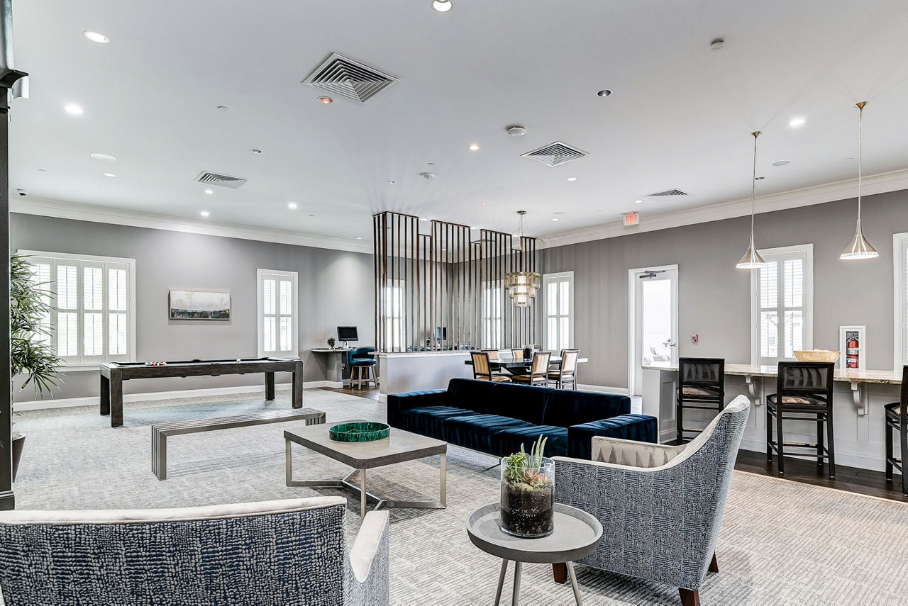 Game room with pool table and seating area at Paragon at Columbia Overlook Apartments, designed for leisure and entertainment
