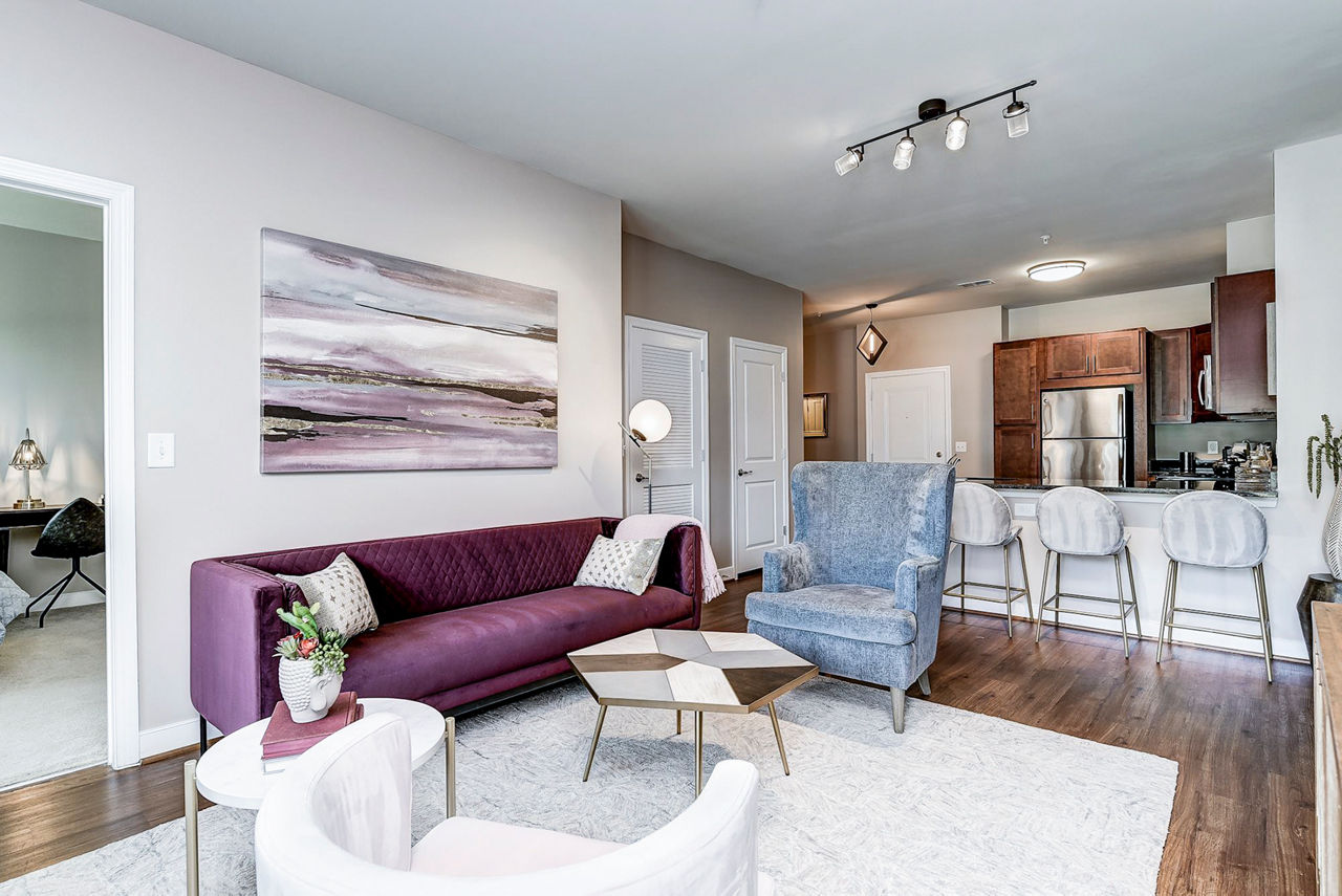 Spacious living room with modern decor at Paragon at Columbia Overlook Apartments