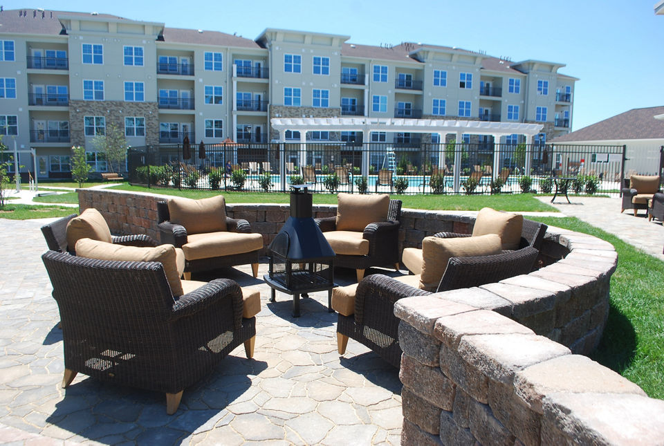 Patio with modern outdoor furniture at Paragon at Columbia Overlook Apartments