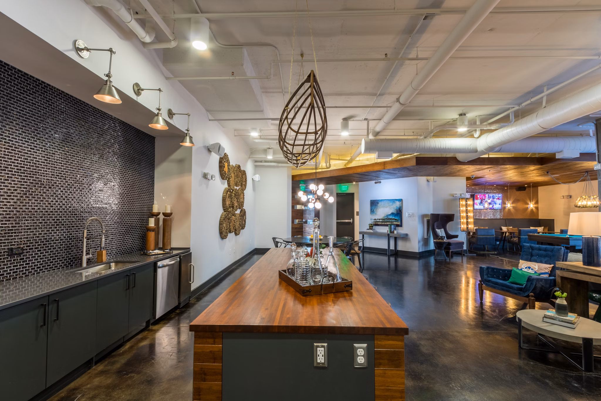 Clubhouse with modern seating and large windows at Ellison on Broad Apartments in Atlanta, offering luxury living spaces for residents