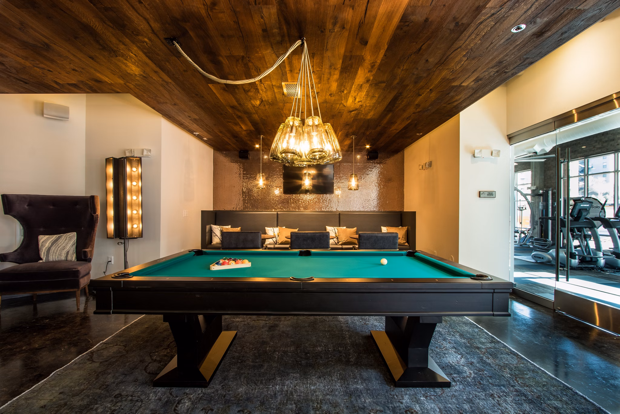 Clubhouse featuring modern design and comfortable seating at Ellison on Broad Apartments