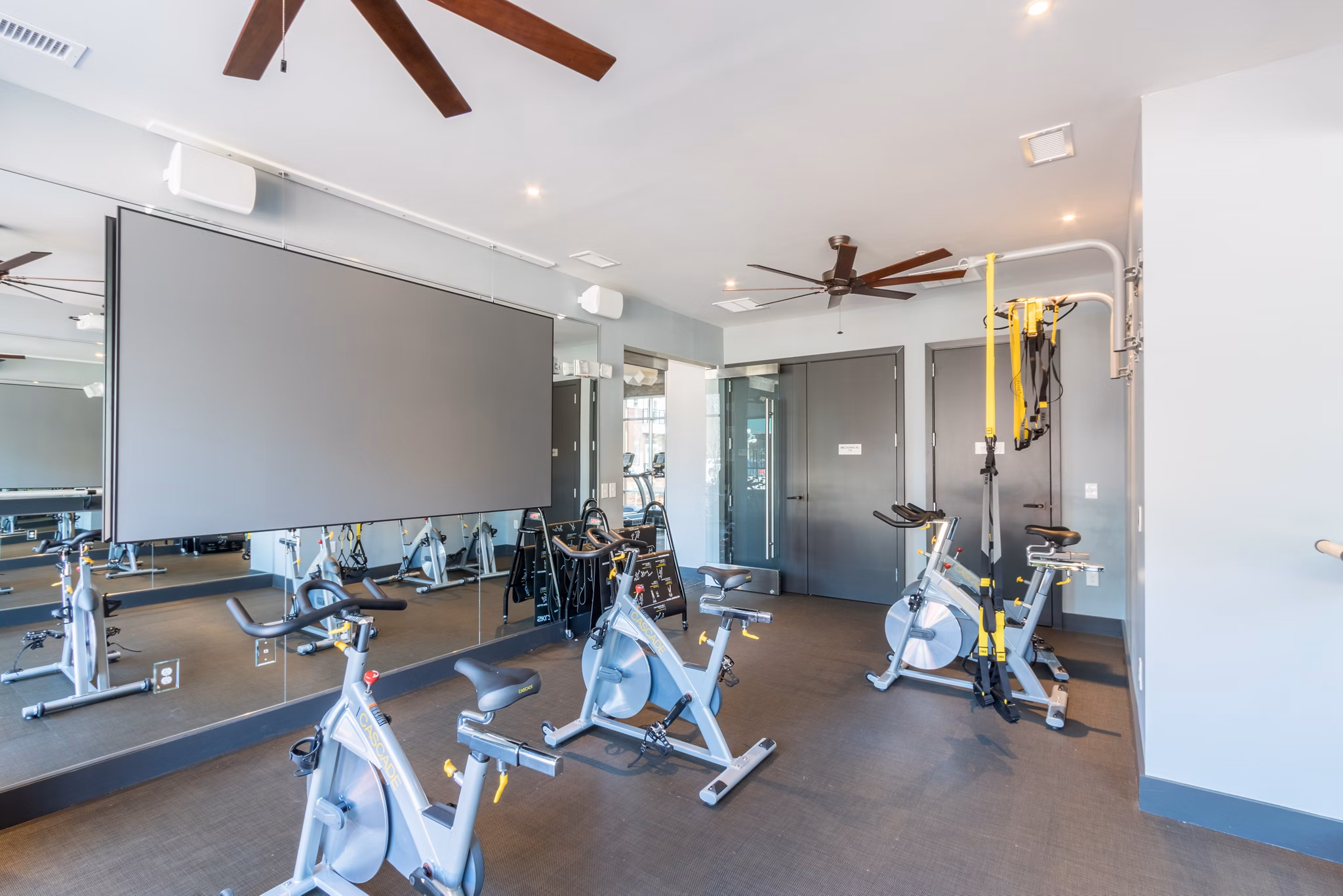 State-of-the-art fitness center at Ellison on Broad Apartments with modern equipment and spacious workout areas
