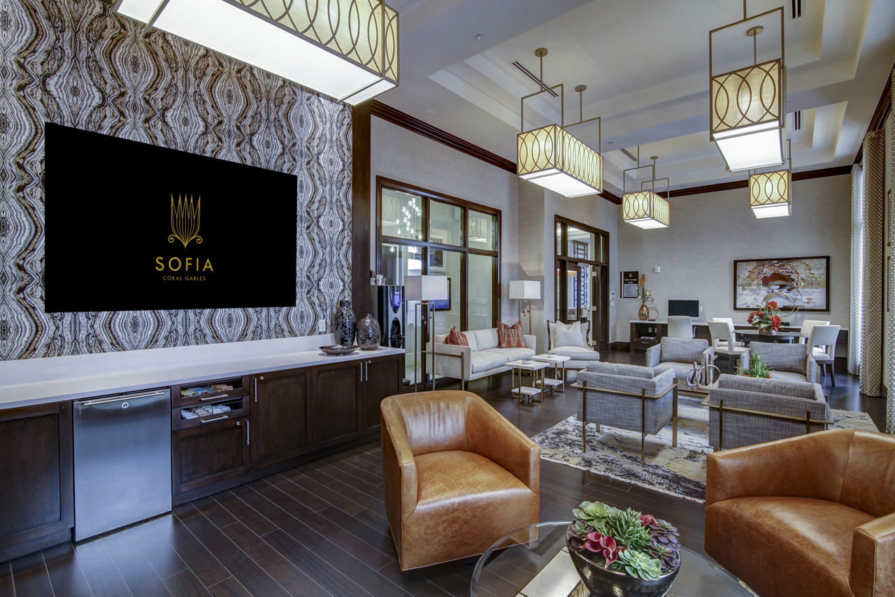 Clubhouse featuring modern design and luxury seating at Sofia Coral Gables Apartments