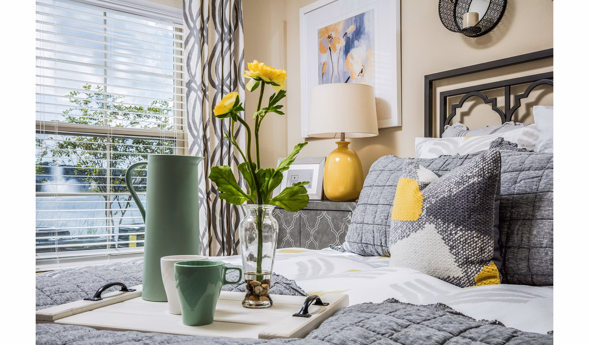 Spacious bedroom with modern decor at Sanctuary at West Port Apartments
