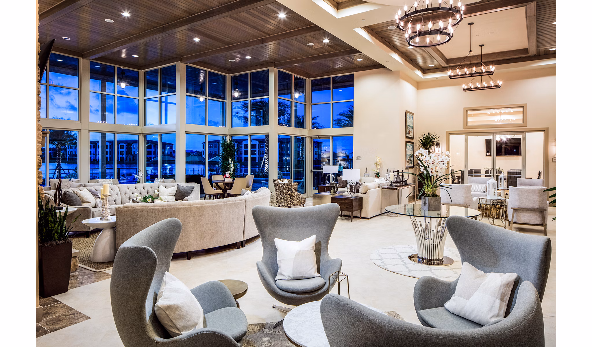 Inviting clubhouse lobby with modern design and cozy seating at Sanctuary at West Port Apartments