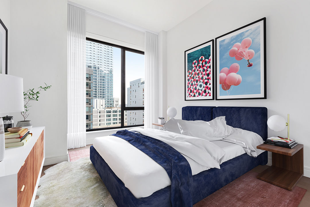 Spacious bedroom with modern dÃ©cor at Watermark LIC luxury apartments