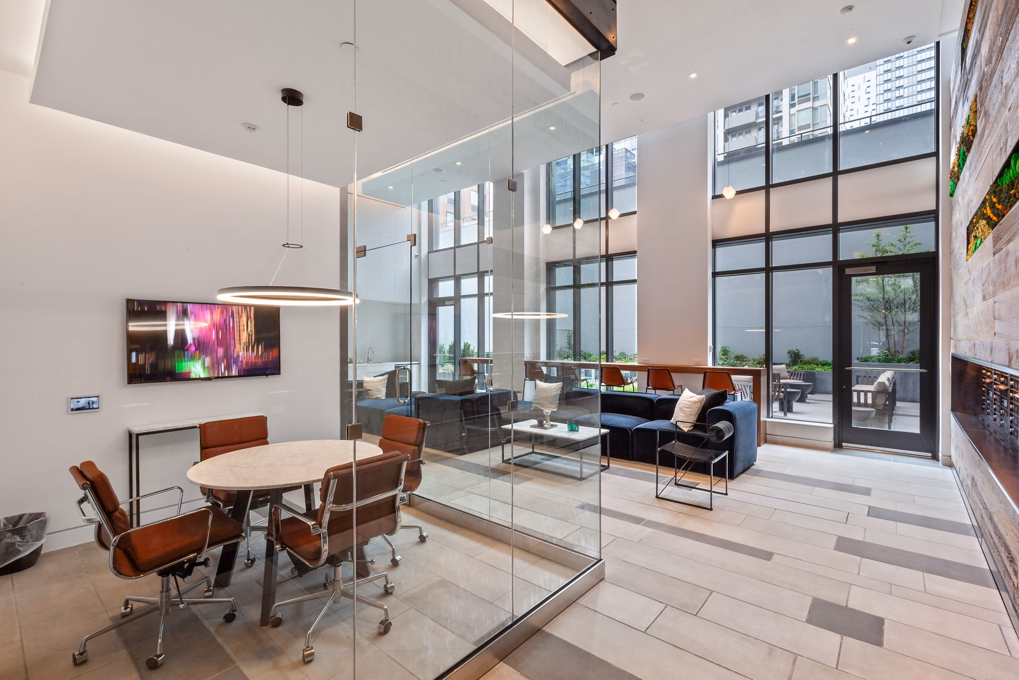 Clubhouse featuring modern design and social seating at Watermark LIC apartments