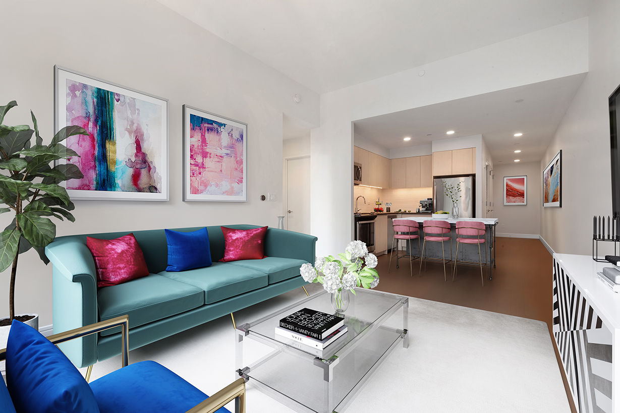 Spacious living room with sleek furnishings and city views in Watermark LIC luxury apartments