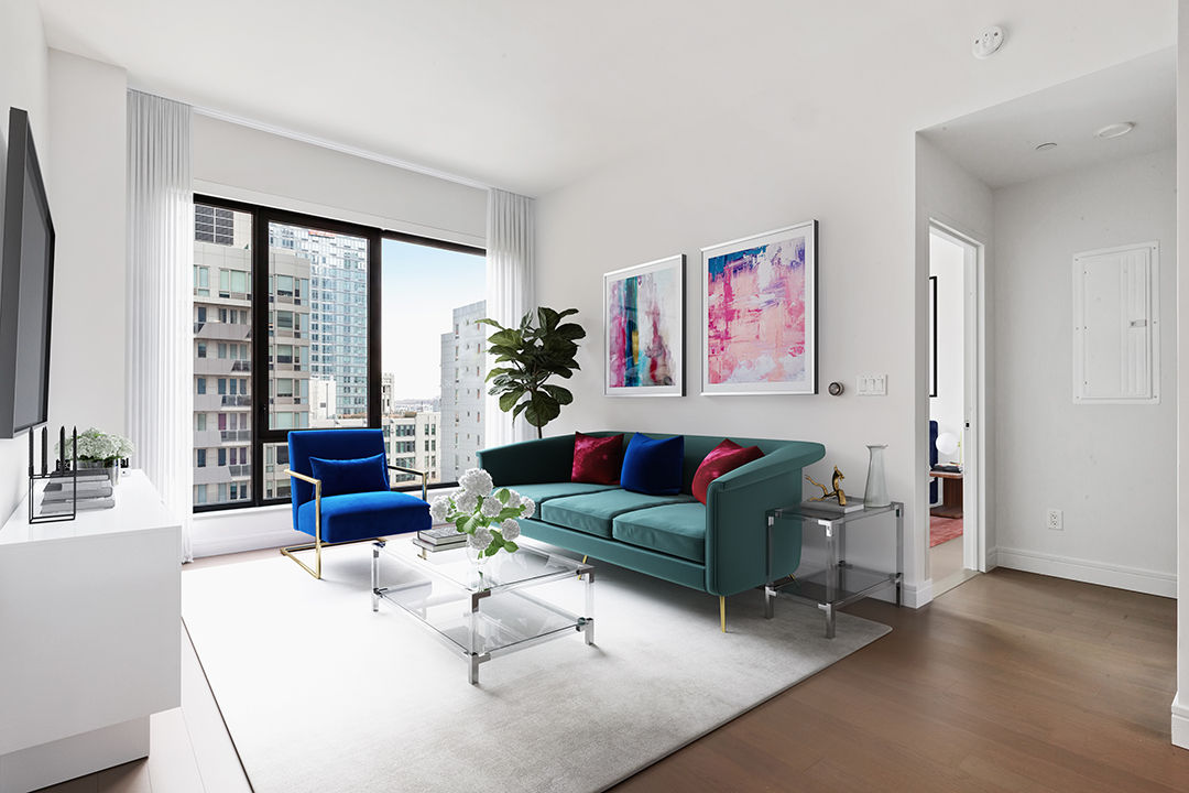 Spacious living room with modern decor in Watermark LIC apartments