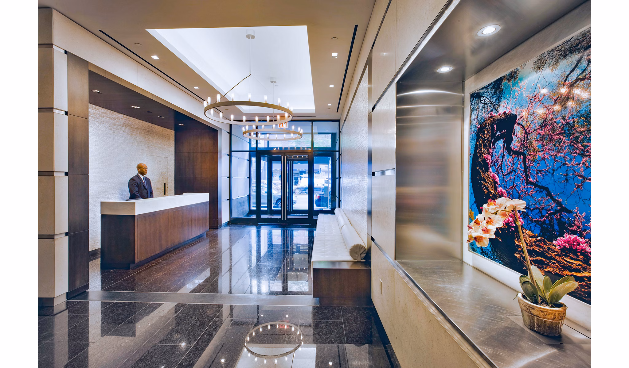 Lobby entrance with elegant decor and modern seating at INSTRATA Gramercy Apartments, a luxury high-rise in the heart of New York City
