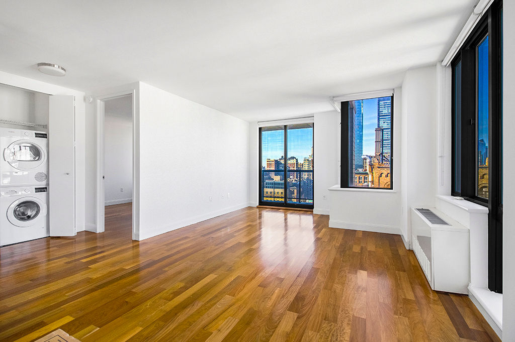 Laundry room at Instrata Gramercy Apartments