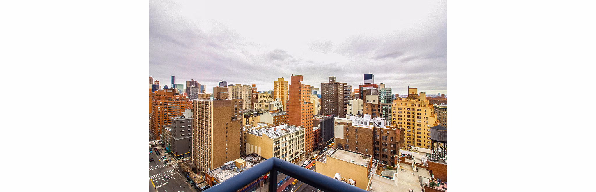 Private patio/balcony with city views at INSTRATA Gramercy Apartments, offering a luxury outdoor retreat in the heart of New York