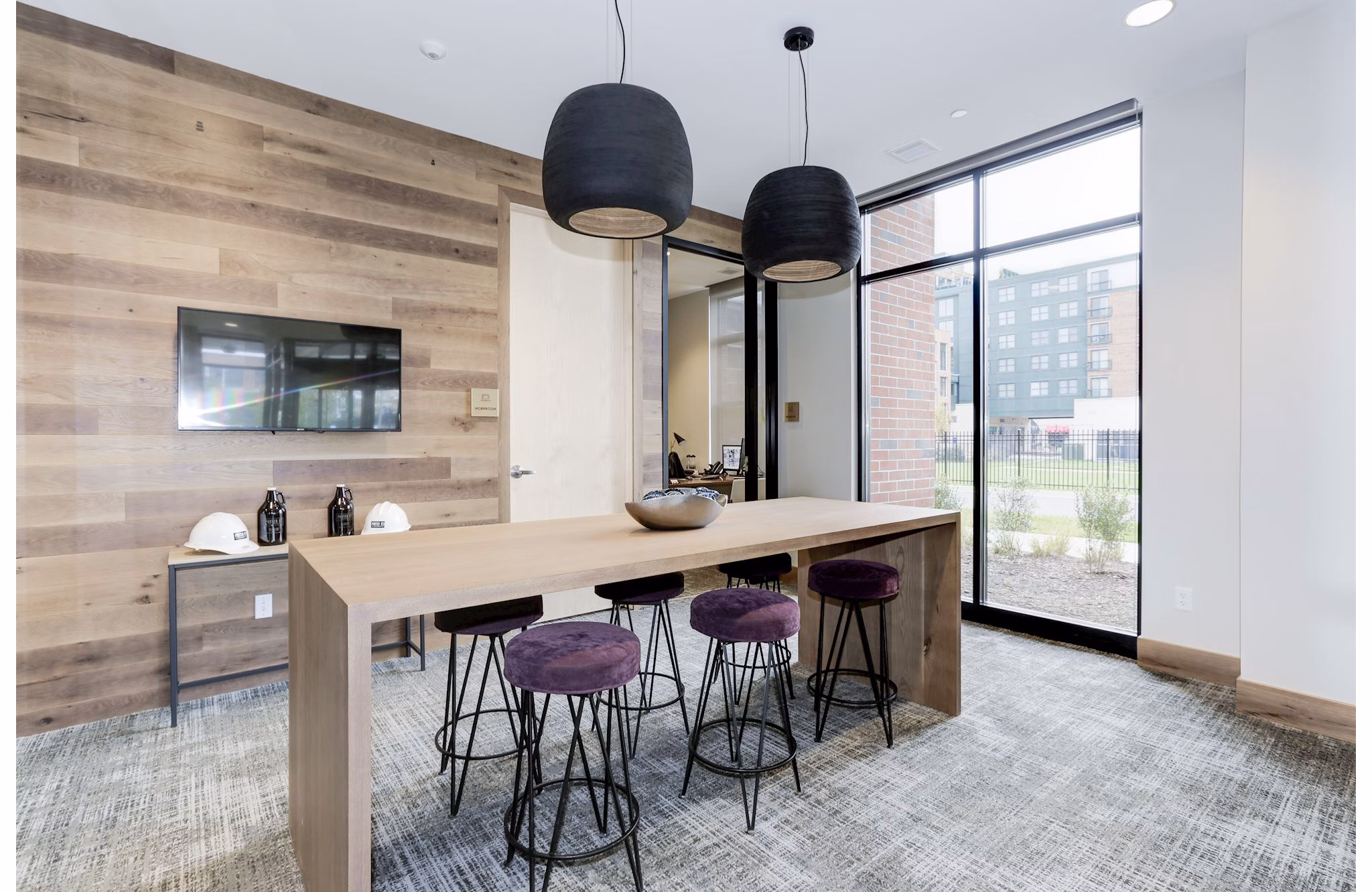 Clubhouse featuring modern amenities at Porter Street Apartments, a luxury Greystar community