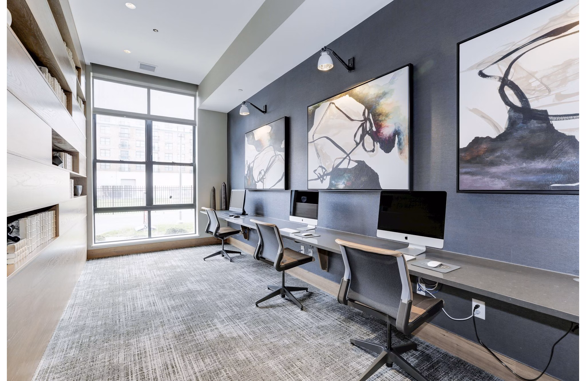Modern business center with workstations at Porter Street Apartments