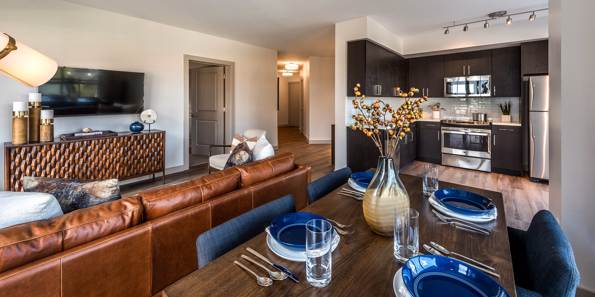 High-rise luxury apartments in vibrant urban setting, showcasing modern design and amenities â€“ Greystar
