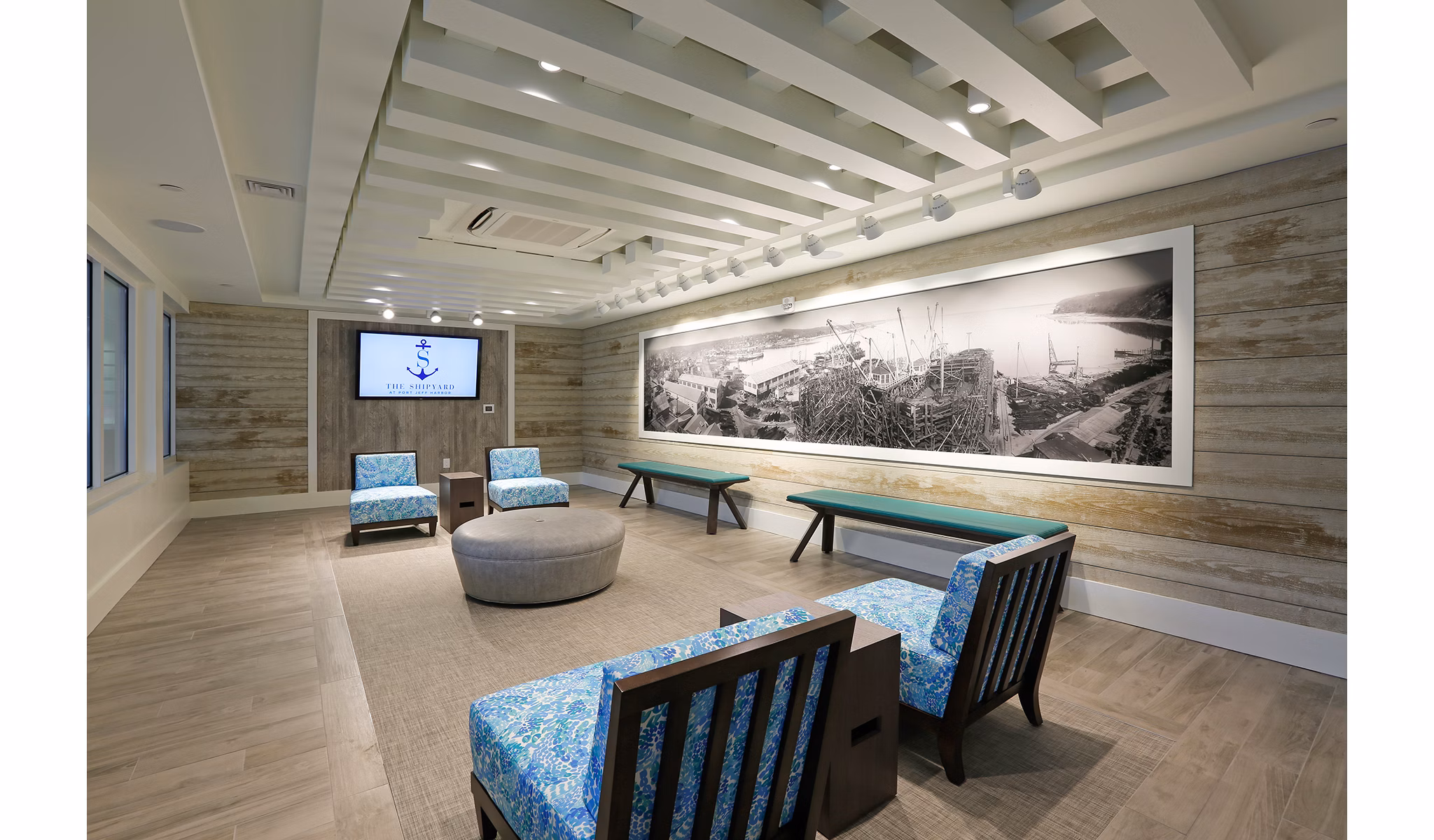 Clubhouse with modern seating and pool table at The Shipyard at Port Jefferson Harbor Apartments